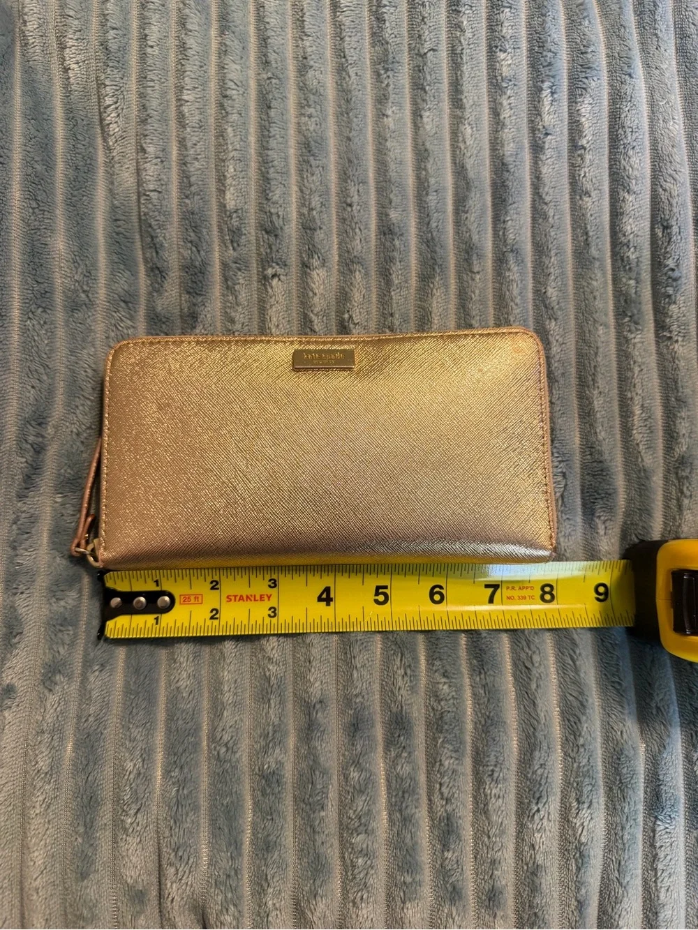 kate spade metallic rose gold zip-around wallet